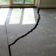 a huge crack in a concrete slab floor in Gaithersburg
