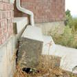 sinking outdoor concrete steps in College Park
