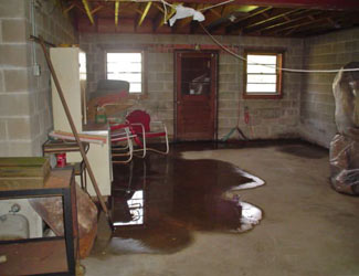 a flooded basement floor in a Brunswick home
