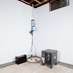 Sump pump system, dehumidifier, and basement wall panels installed during a sump pump installation in Westminster