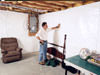 A basement wall covering for creating a vapor barrier on basement walls in Laurel