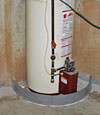 An old, outdated water heater system that is protected by the FloodRing