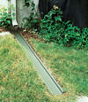 A recessed gutter drain extension installed in Brunswick, Maryland