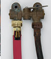 FloodChek® hose installed next to a rusted, corroded old washer hose, installed for comparison in a Taneytown, Maryland basement