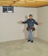 Annapolis basement insulation covered by EverLast™ wall paneling, with SilverGlo™ insulation underneath